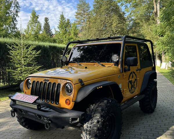 Желтый Джип Вранглер, объемом двигателя 3.6 л и пробегом 170 тыс. км за 23000 $, фото 19 на Automoto.ua