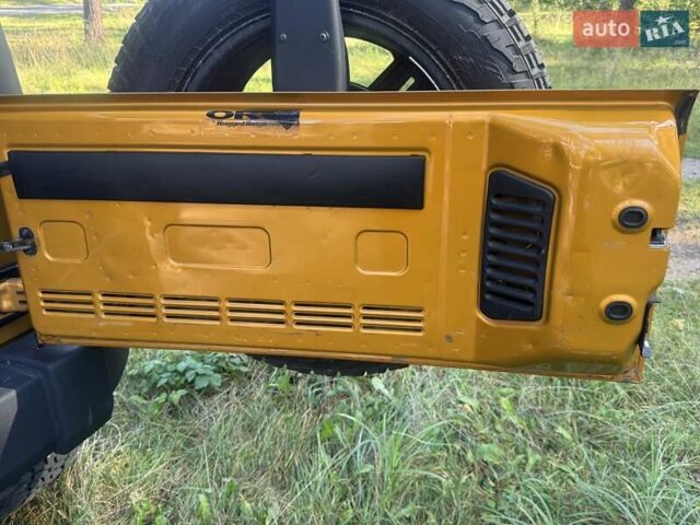 Желтый Джип Вранглер, объемом двигателя 3.61 л и пробегом 157 тыс. км за 22500 $, фото 6 на Automoto.ua