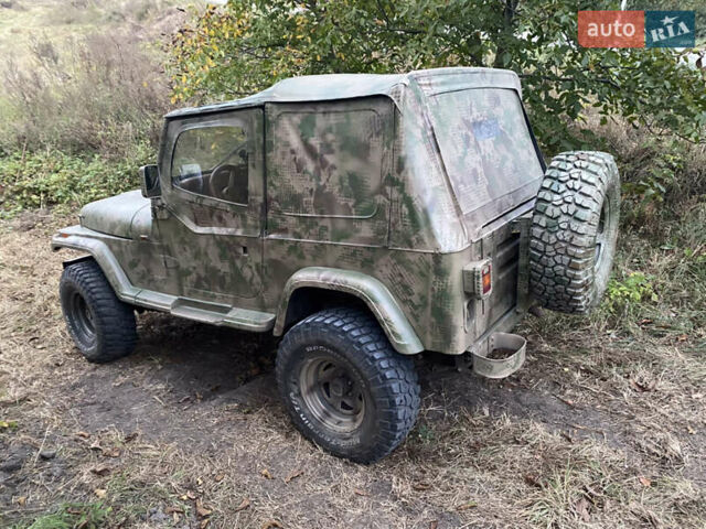 Зелений Джип Wrangler, об'ємом двигуна 2.5 л та пробігом 122 тис. км за 11900 $, фото 1 на Automoto.ua