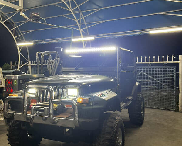 Зеленый Джип Вранглер, объемом двигателя 4 л и пробегом 90 тыс. км за 10500 $, фото 4 на Automoto.ua