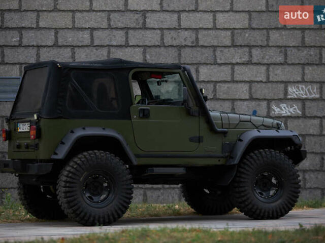 Зелений Джип Wrangler, об'ємом двигуна 4 л та пробігом 177 тис. км за 15900 $, фото 3 на Automoto.ua