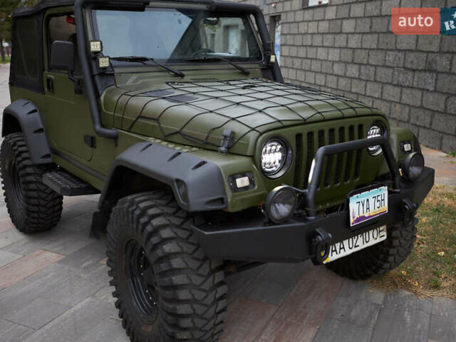 Зеленый Джип Вранглер, объемом двигателя 4 л и пробегом 177 тыс. км за 15900 $, фото 11 на Automoto.ua