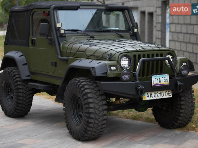 Зеленый Джип Вранглер, объемом двигателя 4 л и пробегом 177 тыс. км за 15900 $, фото 9 на Automoto.ua