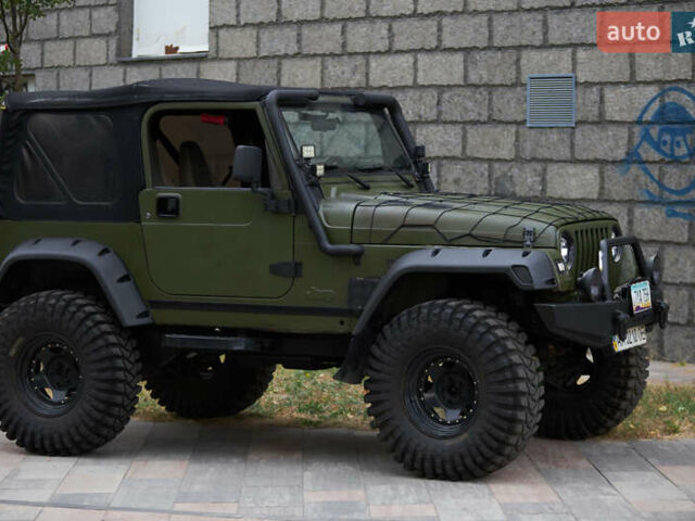 Зеленый Джип Вранглер, объемом двигателя 4 л и пробегом 177 тыс. км за 15900 $, фото 6 на Automoto.ua