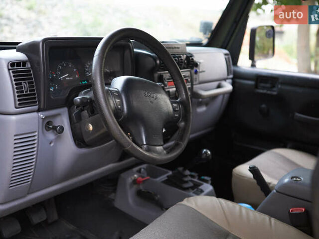 Зеленый Джип Вранглер, объемом двигателя 4 л и пробегом 177 тыс. км за 15900 $, фото 16 на Automoto.ua