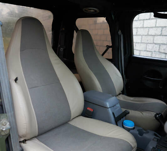 Зелений Джип Wrangler, об'ємом двигуна 4 л та пробігом 177 тис. км за 15900 $, фото 18 на Automoto.ua
