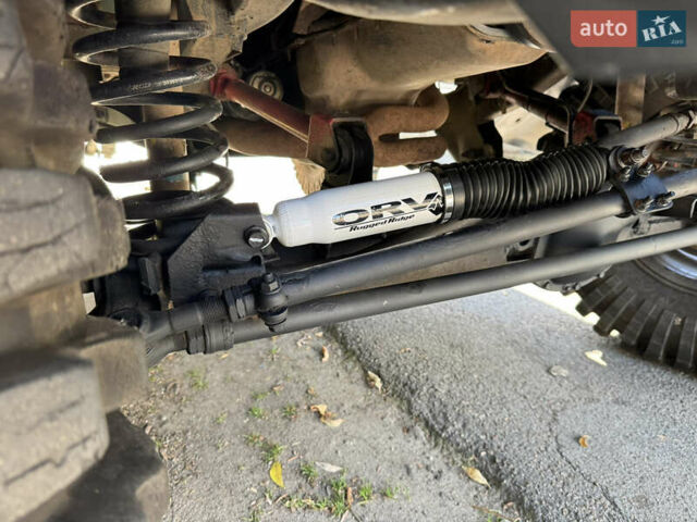 Зеленый Джип Вранглер, объемом двигателя 4 л и пробегом 177 тыс. км за 15900 $, фото 25 на Automoto.ua