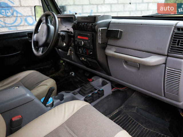 Зеленый Джип Вранглер, объемом двигателя 4 л и пробегом 177 тыс. км за 15900 $, фото 15 на Automoto.ua