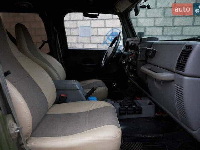 Зеленый Джип Вранглер, объемом двигателя 4 л и пробегом 177 тыс. км за 15900 $, фото 21 на Automoto.ua