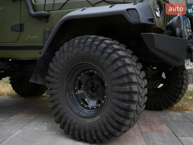 Зеленый Джип Вранглер, объемом двигателя 4 л и пробегом 177 тыс. км за 15900 $, фото 10 на Automoto.ua