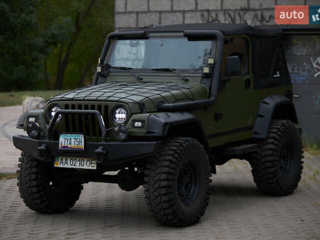 Зеленый Джип Вранглер, объемом двигателя 4 л и пробегом 177 тыс. км за 15900 $, фото 4 на Automoto.ua