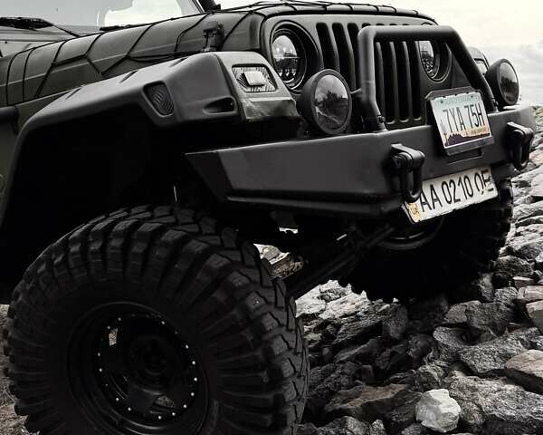 Зеленый Джип Вранглер, объемом двигателя 4 л и пробегом 177 тыс. км за 15900 $, фото 24 на Automoto.ua