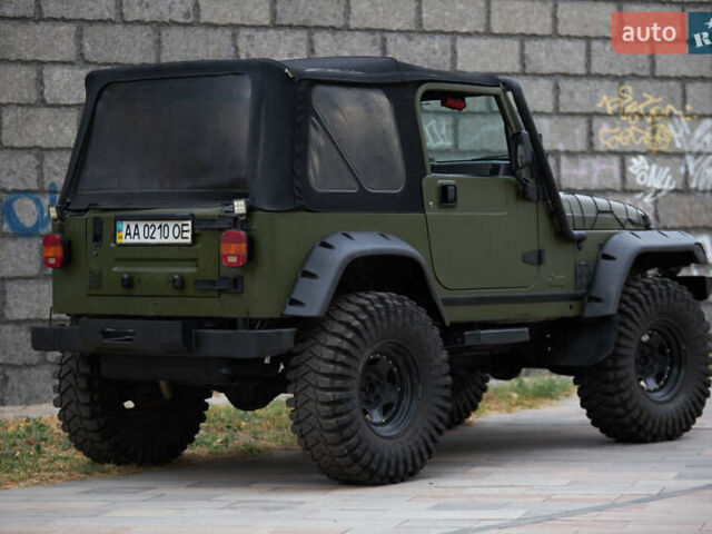 Зеленый Джип Вранглер, объемом двигателя 4 л и пробегом 177 тыс. км за 15900 $, фото 7 на Automoto.ua