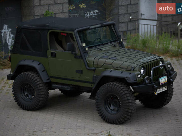 Зеленый Джип Вранглер, объемом двигателя 4 л и пробегом 177 тыс. км за 15900 $, фото 5 на Automoto.ua