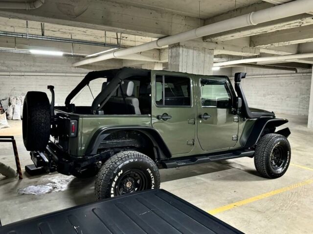 Зеленый Джип Вранглер, объемом двигателя 2.8 л и пробегом 148 тыс. км за 22000 $, фото 1 на Automoto.ua