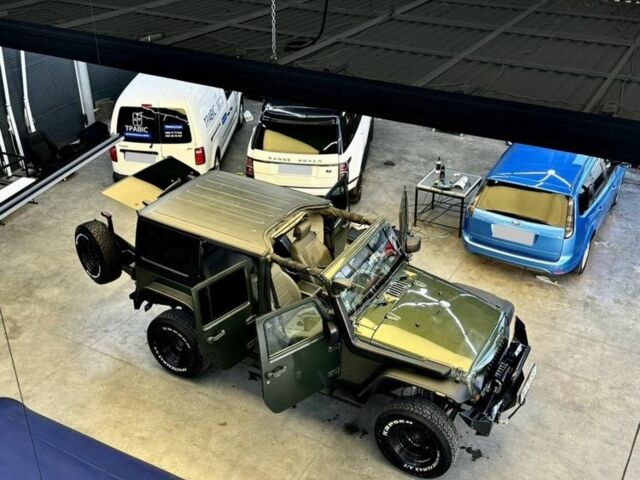 Зеленый Джип Вранглер, объемом двигателя 2.8 л и пробегом 148 тыс. км за 22000 $, фото 6 на Automoto.ua