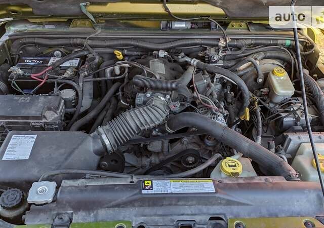 Зеленый Джип Вранглер, объемом двигателя 3.8 л и пробегом 124 тыс. км за 17000 $, фото 13 на Automoto.ua