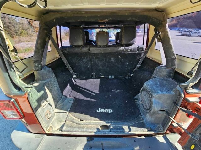 Оранжевый Джип Вранглер, объемом двигателя 2.7 л и пробегом 166 тыс. км за 6500 $, фото 4 на Automoto.ua