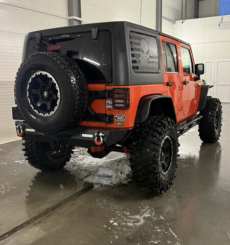 Оранжевый Джип Вранглер, объемом двигателя 3.6 л и пробегом 165 тыс. км за 26900 $, фото 3 на Automoto.ua