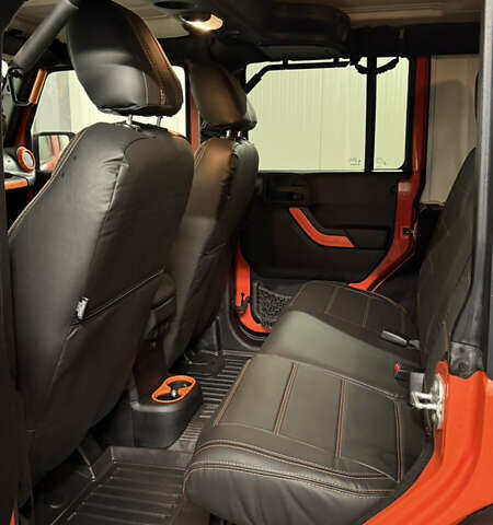 Оранжевый Джип Вранглер, объемом двигателя 3.6 л и пробегом 165 тыс. км за 26900 $, фото 15 на Automoto.ua