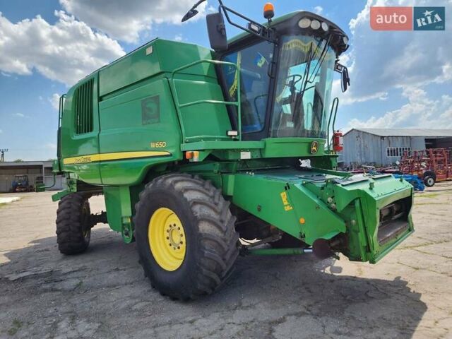 Зеленый Джон Дир 1210G, объемом двигателя 9.1 л и пробегом 675 тыс. км за 85000 $, фото 1 на Automoto.ua
