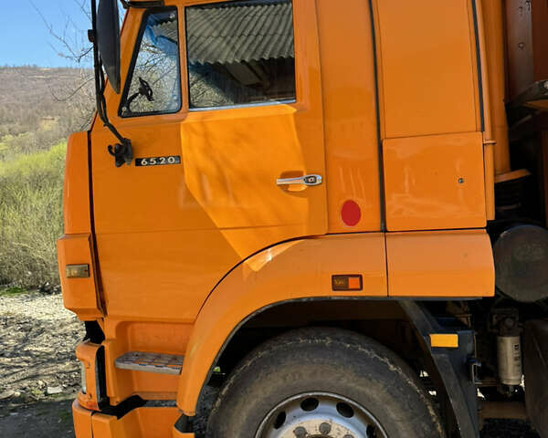 Помаранчевий КамАЗ 6520, об'ємом двигуна 11.76 л та пробігом 240 тис. км за 19200 $, фото 1 на Automoto.ua