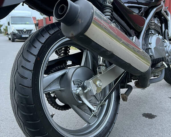 Фіолетовий Кавасакі ER-5, об'ємом двигуна 0.5 л та пробігом 13 тис. км за 2450 $, фото 13 на Automoto.ua