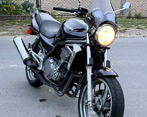 Фіолетовий Кавасакі ER-5, об'ємом двигуна 0.5 л та пробігом 13 тис. км за 2450 $, фото 19 на Automoto.ua