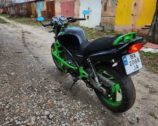 Чорний Кавасакі ER 500A, об'ємом двигуна 0.5 л та пробігом 45 тис. км за 2300 $, фото 1 на Automoto.ua