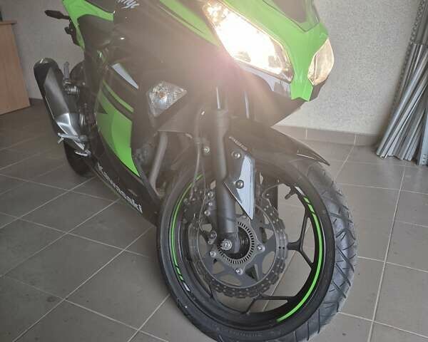 Зеленый Кавасаки EX 300, объемом двигателя 0.3 л и пробегом 17 тыс. км за 4500 $, фото 5 на Automoto.ua