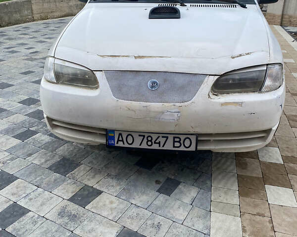 Белый Киа Авелла, объемом двигателя 1.5 л и пробегом 300 тыс. км за 1500 $, фото 2 на Automoto.ua