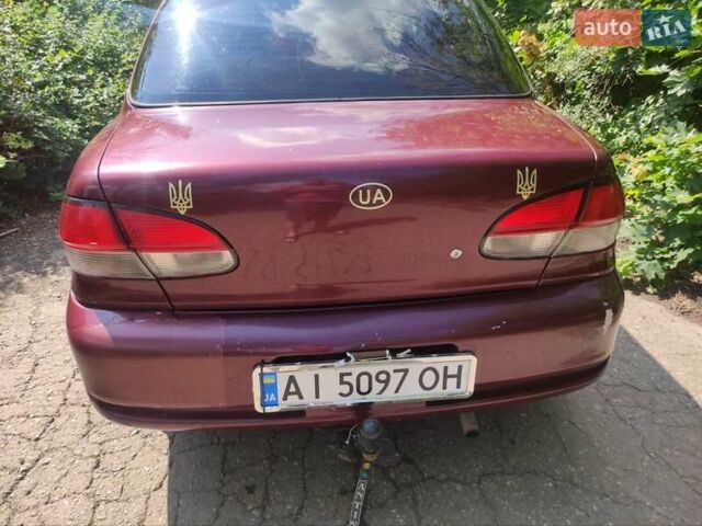 Красный Киа Авелла, объемом двигателя 1.5 л и пробегом 186 тыс. км за 1699 $, фото 8 на Automoto.ua