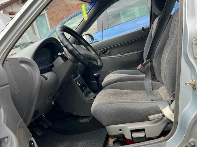 Серый Киа Авелла, объемом двигателя 1.5 л и пробегом 285 тыс. км за 2000 $, фото 5 на Automoto.ua