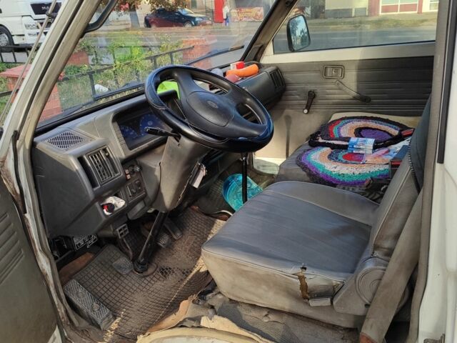 Белый Киа Беста, объемом двигателя 2 л и пробегом 275 тыс. км за 2200 $, фото 5 на Automoto.ua
