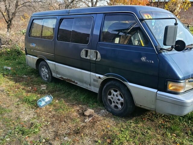 Синій Кіа Беста, об'ємом двигуна 2 л та пробігом 280 тис. км за 979 $, фото 5 на Automoto.ua