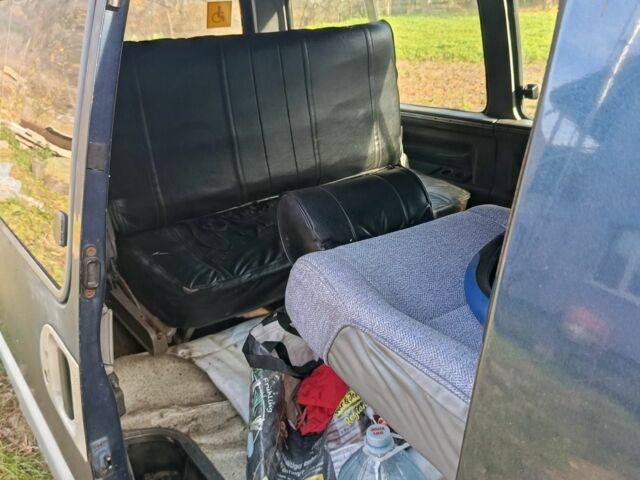 Синій Кіа Беста, об'ємом двигуна 2 л та пробігом 280 тис. км за 979 $, фото 2 на Automoto.ua