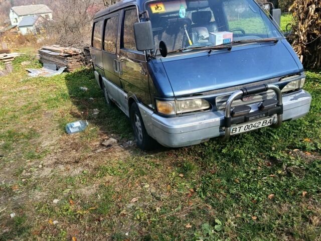 Синій Кіа Беста, об'ємом двигуна 2 л та пробігом 280 тис. км за 979 $, фото 4 на Automoto.ua