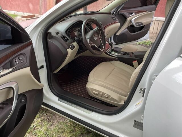 Белый Киа Каденза, объемом двигателя 2 л и пробегом 147 тыс. км за 9000 $, фото 3 на Automoto.ua