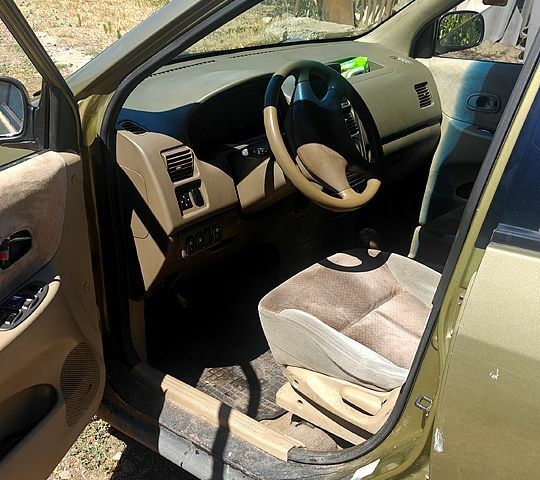 Бежевый Киа Каренс, объемом двигателя 1.8 л и пробегом 338 тыс. км за 3000 $, фото 6 на Automoto.ua