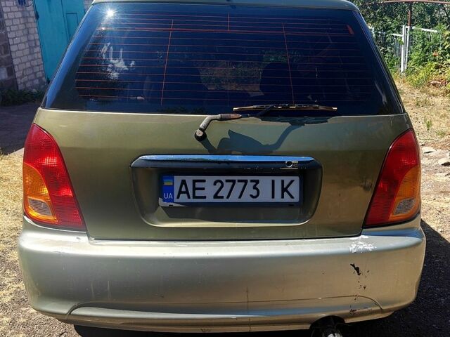 Бежевый Киа Каренс, объемом двигателя 1.8 л и пробегом 338 тыс. км за 3000 $, фото 3 на Automoto.ua