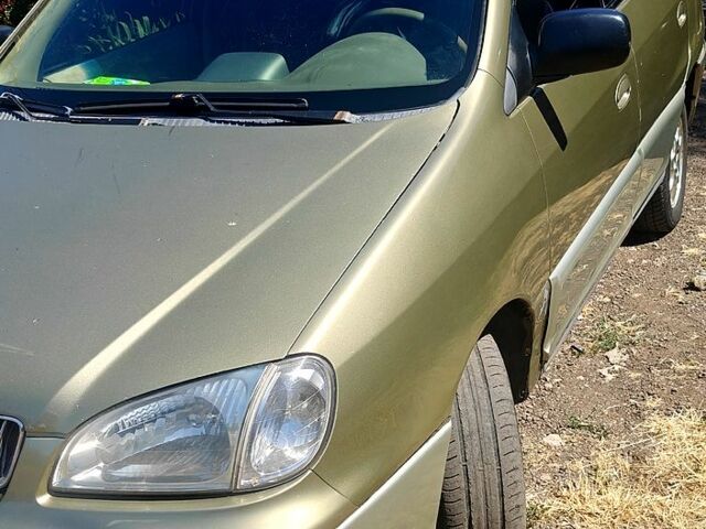 Бежевый Киа Каренс, объемом двигателя 1.8 л и пробегом 338 тыс. км за 3000 $, фото 4 на Automoto.ua