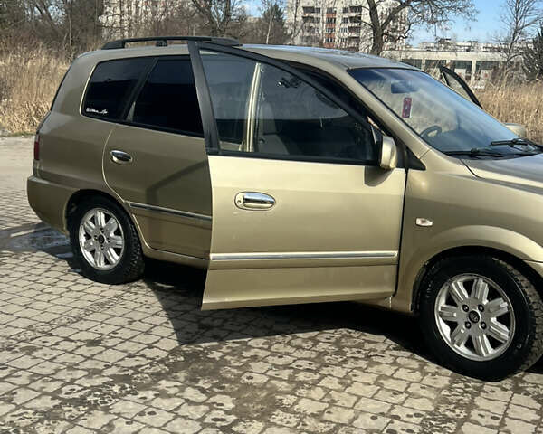 Бежевый Киа Каренс, объемом двигателя 1.79 л и пробегом 299 тыс. км за 3199 $, фото 6 на Automoto.ua