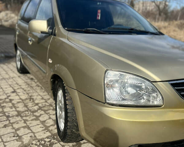 Бежевый Киа Каренс, объемом двигателя 1.79 л и пробегом 299 тыс. км за 3199 $, фото 4 на Automoto.ua