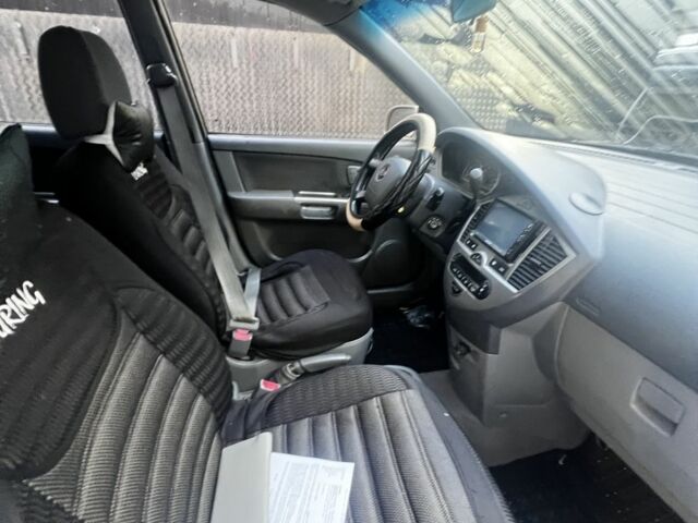 Бежевий Кіа Каренс, об'ємом двигуна 1.8 л та пробігом 291 тис. км за 3900 $, фото 6 на Automoto.ua