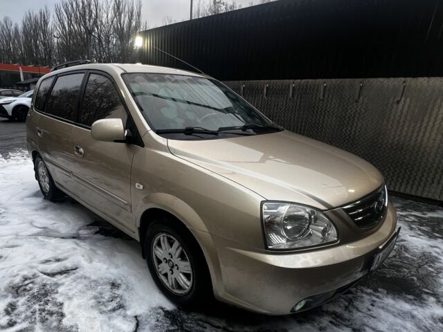 Бежевий Кіа Каренс, об'ємом двигуна 1.8 л та пробігом 291 тис. км за 3900 $, фото 3 на Automoto.ua