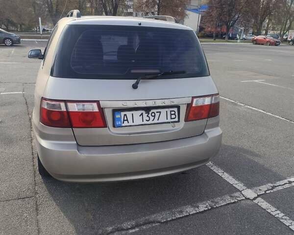 Бежевий Кіа Каренс, об'ємом двигуна 1.8 л та пробігом 327 тис. км за 4000 $, фото 8 на Automoto.ua