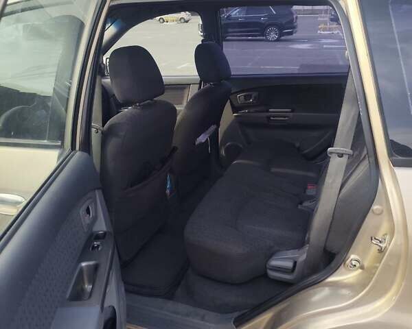 Бежевий Кіа Каренс, об'ємом двигуна 1.8 л та пробігом 327 тис. км за 4000 $, фото 12 на Automoto.ua