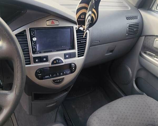 Бежевий Кіа Каренс, об'ємом двигуна 1.8 л та пробігом 327 тис. км за 4000 $, фото 10 на Automoto.ua