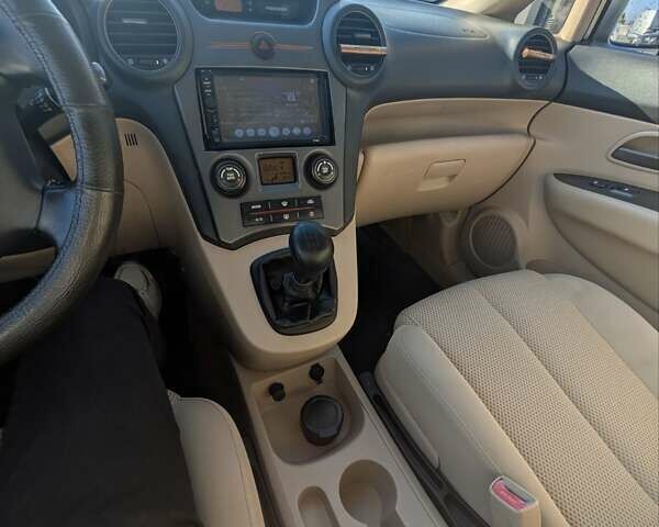 Бежевый Киа Каренс, объемом двигателя 2 л и пробегом 322 тыс. км за 5300 $, фото 17 на Automoto.ua