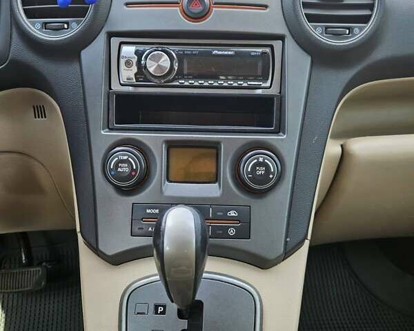 Бежевий Кіа Каренс, об'ємом двигуна 2 л та пробігом 287 тис. км за 4500 $, фото 1 на Automoto.ua